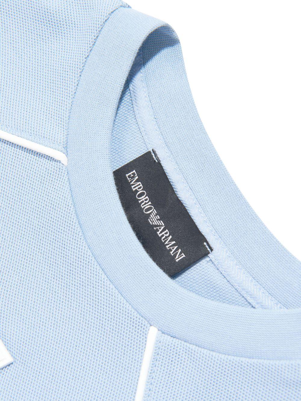 T-shirt per bambino Emporio Armani Kids azzurra con toppa con logo sul davanti EB001345 AF10497 U9360 EMPORIO ARMANI KIDS 