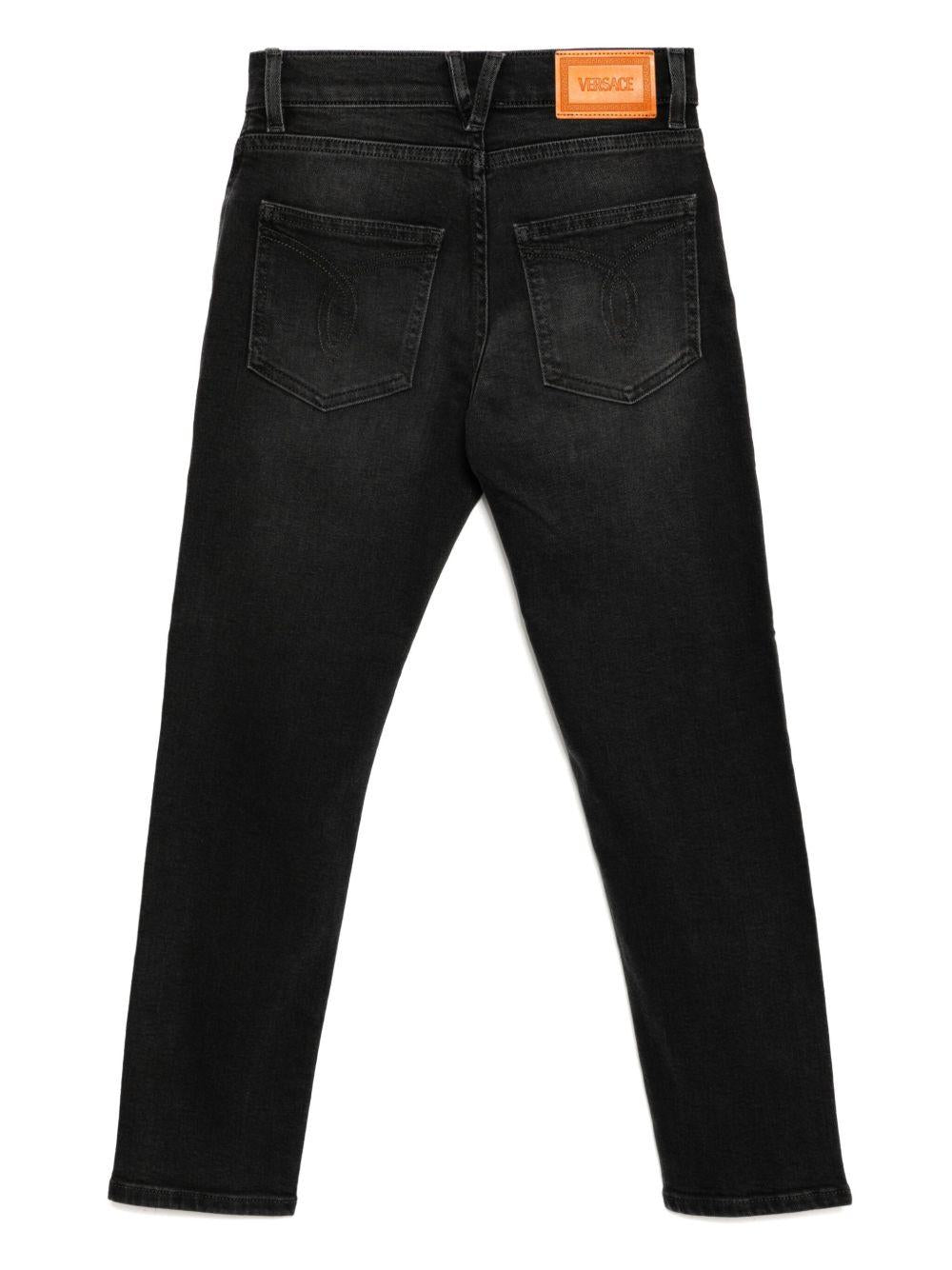 Jeans per bambina Versace Kids in denim nero modello dritto 10184651A13136 1D040 VERSACE KIDS 