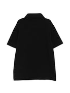 Polo per bambino Balmain Kids nera con dettaglio logo applicato BY8Q01 Z3658 930NE BALMAIN KIDS 