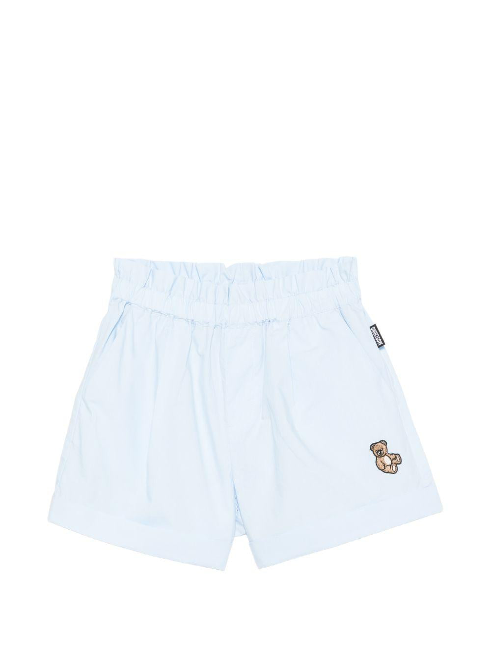 Shorts per bambina Moschino Kids azzurro con vita elasticizzata HDQ01YLLA10 40543 MOSCHINO KIDS 