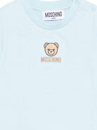 T-shirt per neonati Moschino Kids azzurra con dettagli ricamati MYM047LAA23 40304 MOSCHINO KIDS 
