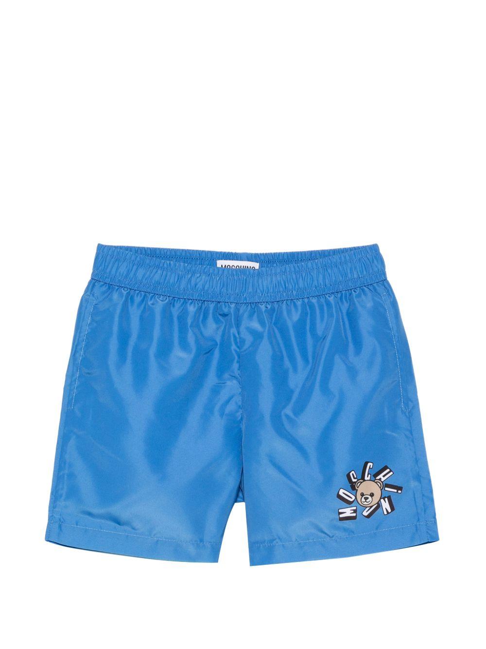 Costume da bagno per bambino Moschino Kids azzurro con stampa logo HUL01LLKA02 40630 MOSCHINO KIDS 