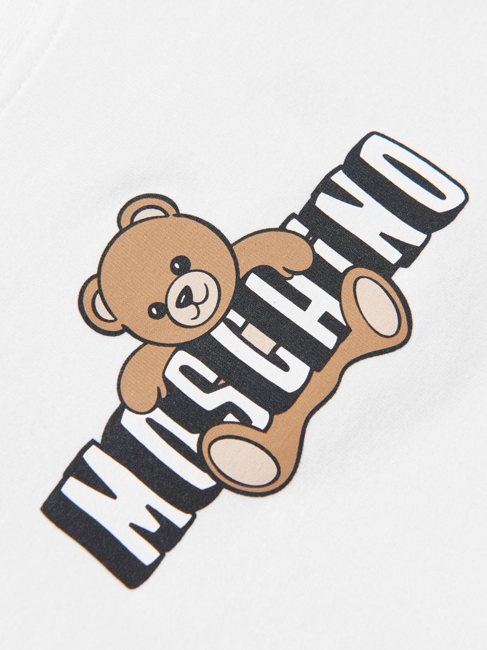 Set t-shirt e shorts per bambina Moschino Kids bianco e nero con motivo Teddy Bear HAG01HLBA00 80359 MOSCHINO KIDS 