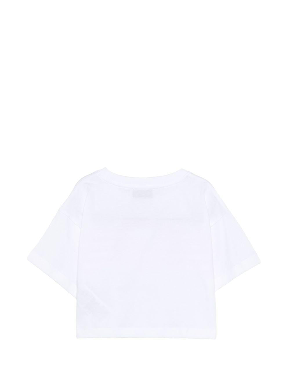 T-shirt per bambina Moschino Kids bianca con stampa ciliegie HDM06YLAA02 10101 MOSCHINO KIDS 