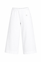 Pantaloni per bambina Douuod Kids bianchi con gamba larga DY6A80 J0371 100 DOUUOD KIDS 