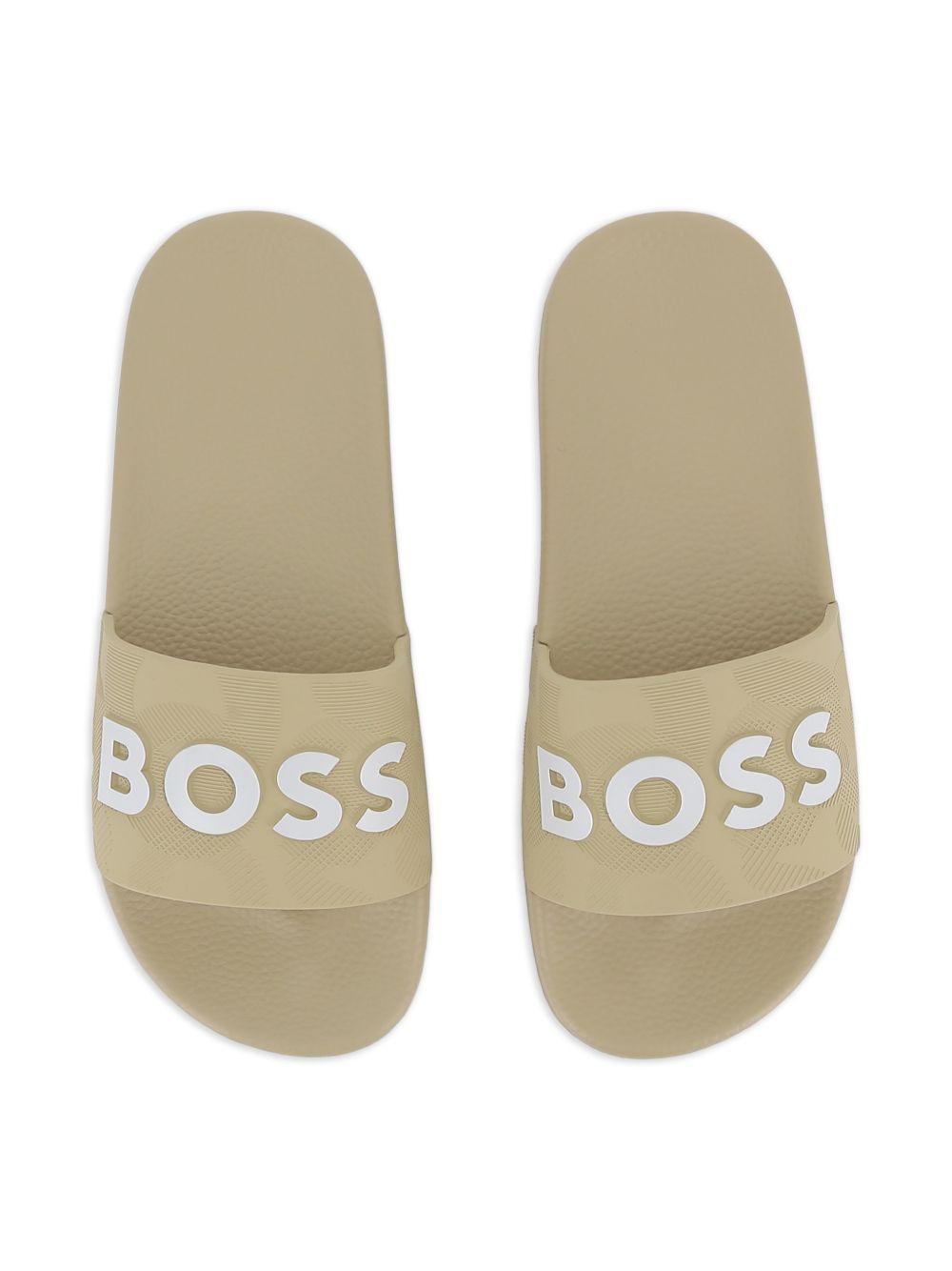 Ciabatte per bambino Boss Kids beige con dettaglio con logo J52799 249 BOSS KIDS 