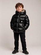 Giubbino Yule per bambino Moncler Kids nero con design imbottito L29541A00066597YX 778 MONCLER KIDS 
