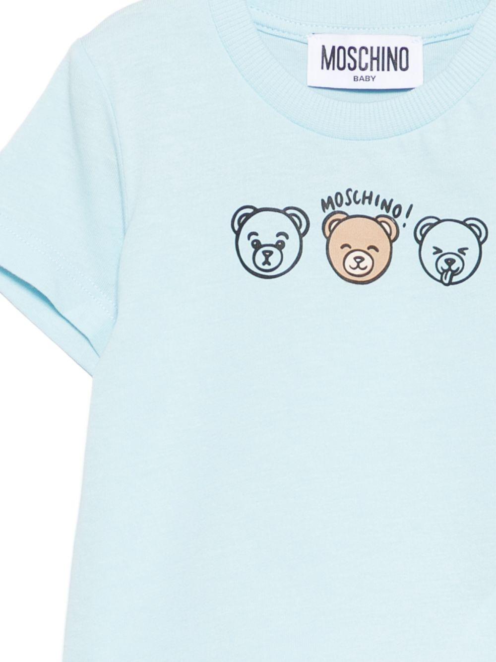 T-shirt per neonato Moschino Kids azzurra con stampa tre orsetti MUM04OLAA24 40304 MOSCHINO KIDS 