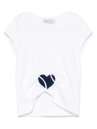 T-shirt con applicazione a cuore per bambina Monnalisa bianco con orlo asimettrico 11E611 5202 9956 MONNALISA 