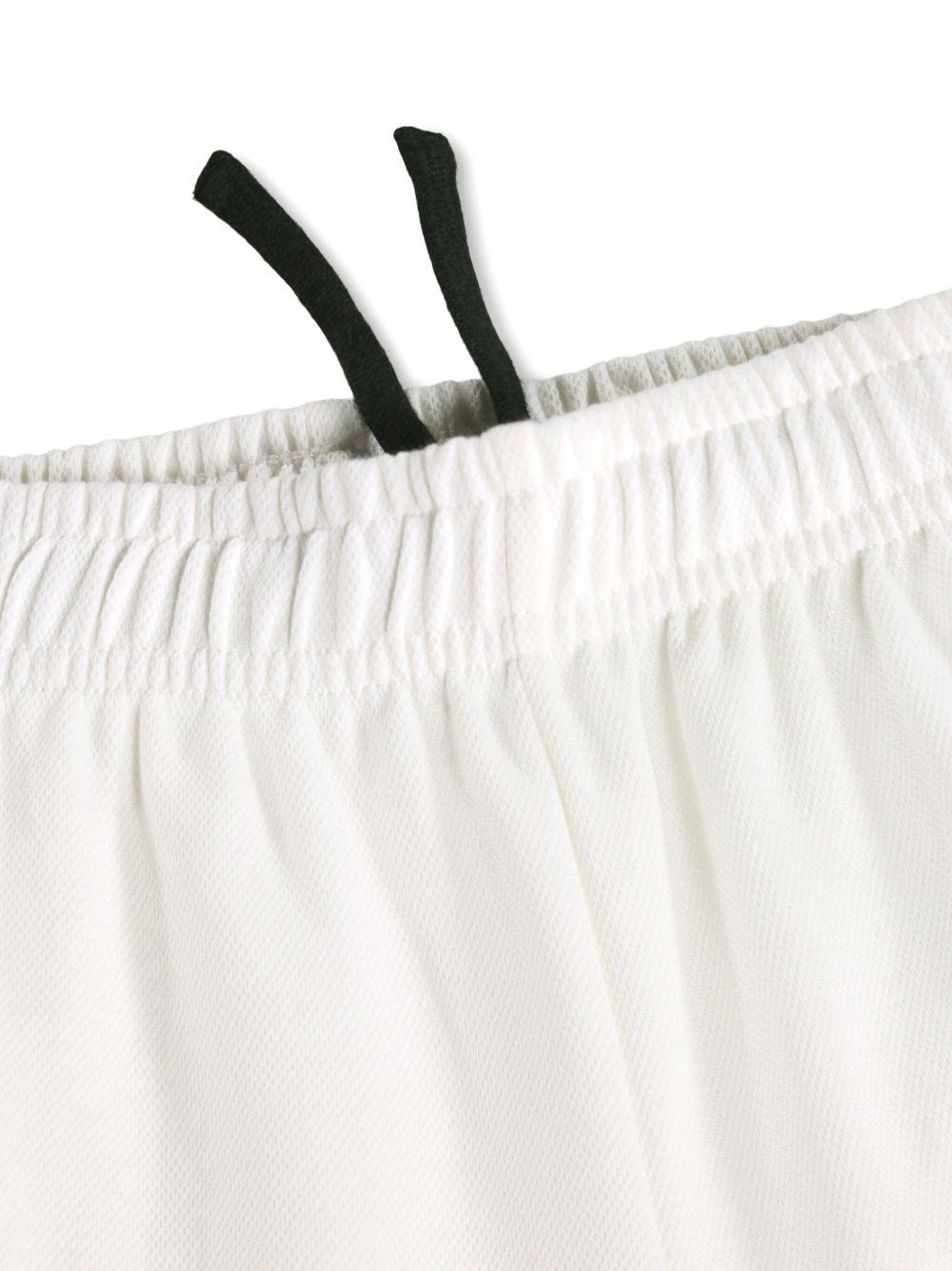 Shorts Adeen per bambino Molo bianchi con bordo a contrasto 1S26H210 5632 MOLO KIDS 
