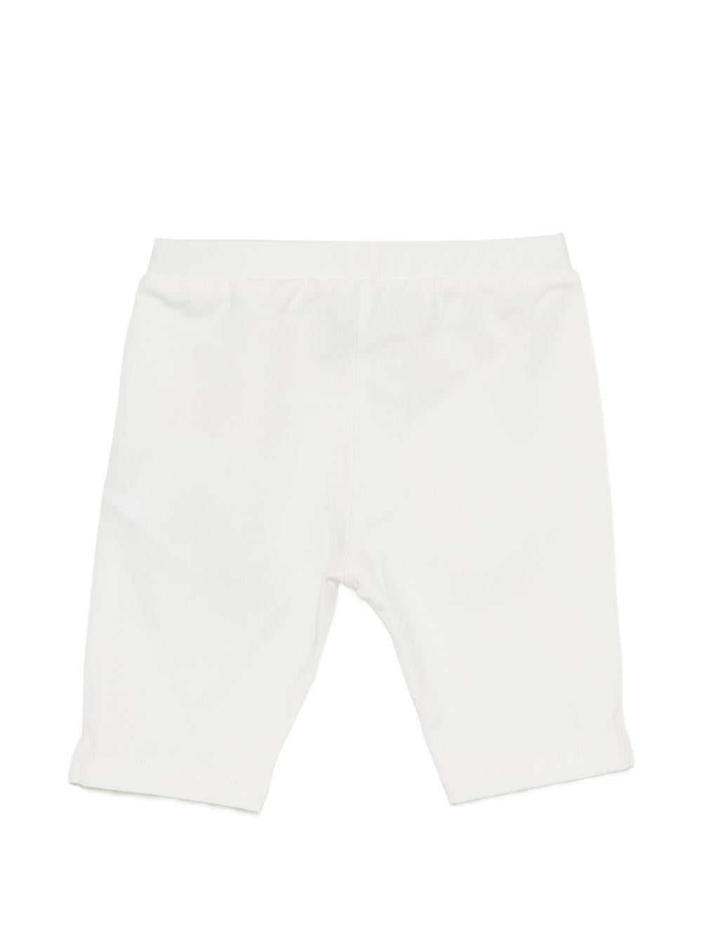 Leggins per neonata Moschino Kids bianchi con logo sul davanti MDP03JLBA00 10063 MOSCHINO KIDS 
