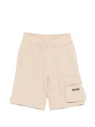 Shorts per bambino Moschino Kids beige con logo sul davanti HUQ02QLCA88 20829 MOSCHINO KIDS 