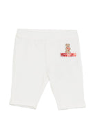 Leggins per neonata Moschino Kids bianchi con logo sul davanti MDP03JLBA00 10063 MOSCHINO KIDS 