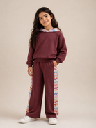 Pantaloni sportivi per bambina Missoni Kids bordeaux con bande laterali MZ6A00 Z3183 530 MISSONI KIDS 