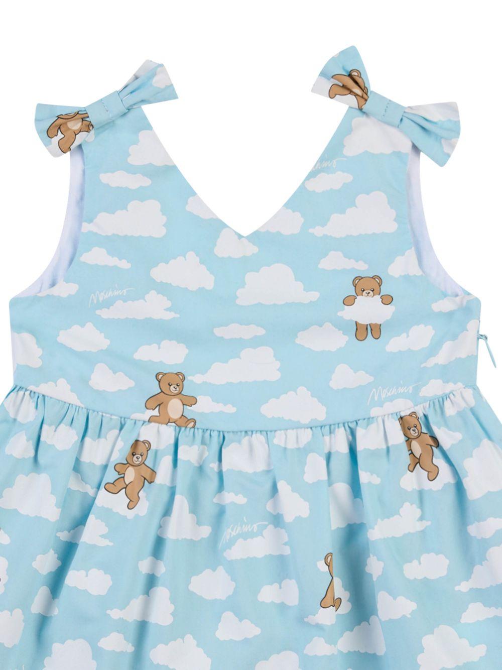 Abito per neonata Moschino Kids azzurro con stampa Teddy Bear all-over MDV0DNLLB61 83679 MOSCHINO KIDS 