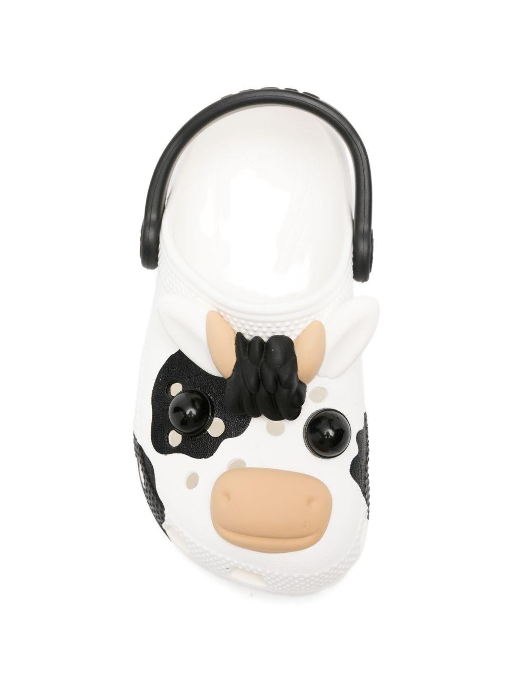 Ciabatte per bambina Crocs Kids bianco e nere con design mucca 212902 WHI CROCS KIDS 