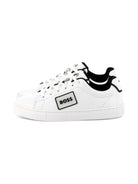 Sneakers per bambino BOSS Kids bianche con dettaglio con placca con logo J52554 10P BOSS KIDS 