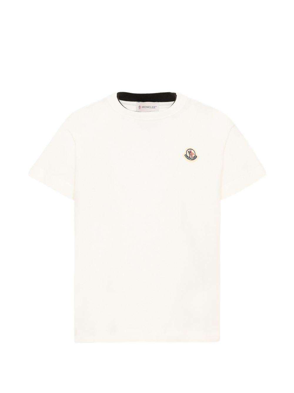 T-shirt per bambino Moncler Enfant bianca con dettaglio logo L29548C0000889AFV 034 MONCLER KIDS 