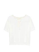 T-shirt per bambina Alberta Ferretti Kids bianca con logo sul davanti R1G600 7120 0001 ALBERTA FERRETTI KIDS 