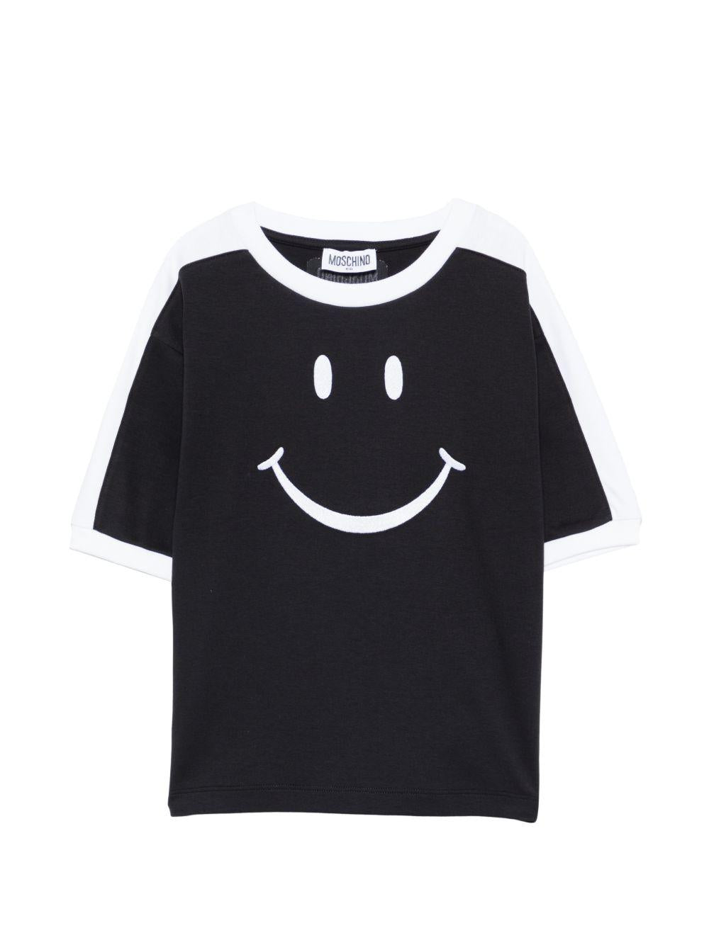 T-shirt per bambino Moschino Kids nera con stampa smile sul davanti HUM05NLAA43 60100 MOSCHINO KIDS 