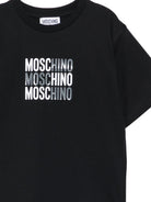 T-shirt per bambini Moschino Kids nera con logo sul davanti H5M05GLAA23 60100 MOSCHINO KIDS 