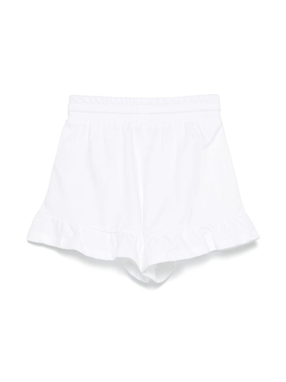 Shorts con stampa Leo Teddy per bambina Moschino Kids bianco con due tasche laterali HAQ014LCA19 10101 MOSCHINO KIDS 