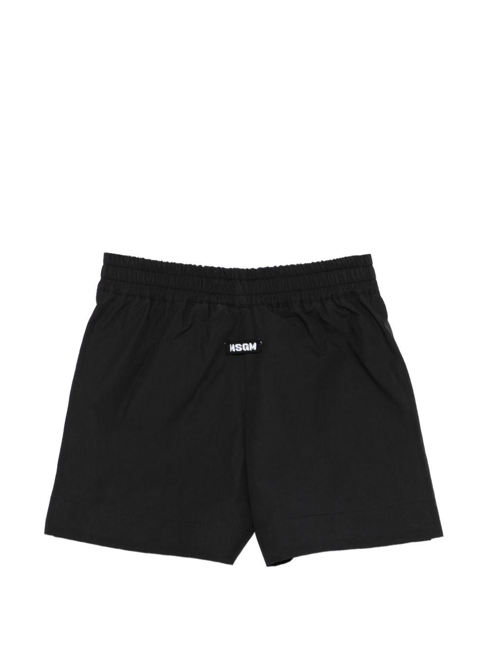 Shorts per bambina MSGM Kids neri con vita arricciata S6MSJGSH098 110 MSGM KIDS 