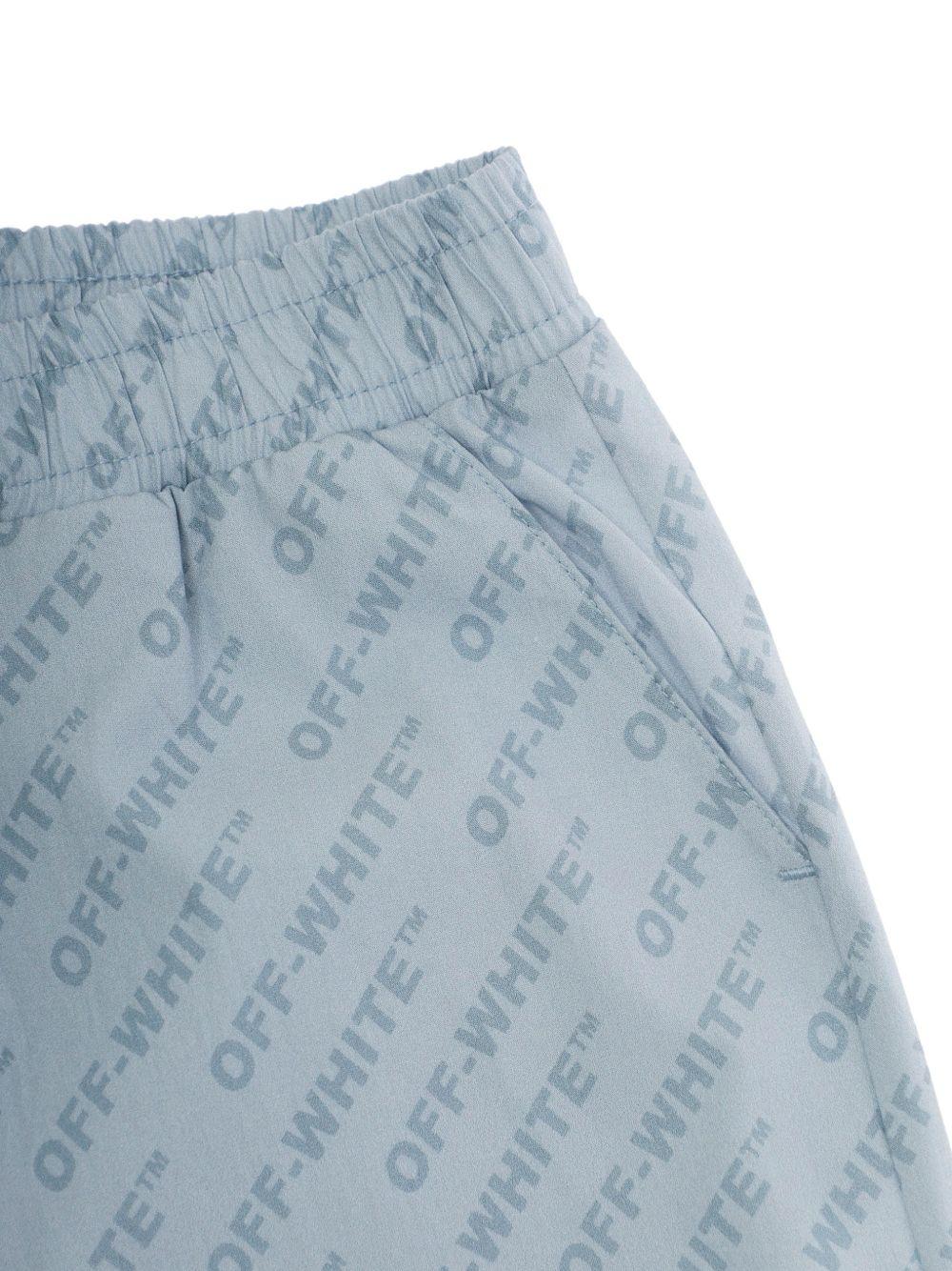 Shorts per bambino Off-White Kids azzurri con stampa logo all-over 44BCB00CS26F001 451 OFF WHITE KIDS 