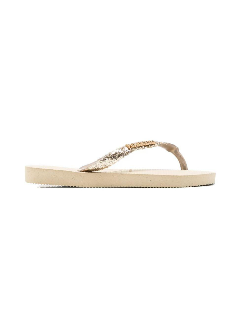 Infradito per bambina Havaianas Kids oro con dettagli glitterati 4146975 0154 HAVAIANAS KIDS 