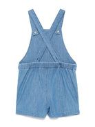 Tuta corta per bambina in denim con ricamo e due tasche diagonali laterali 2523014160 BLUE MINI RODINI 
