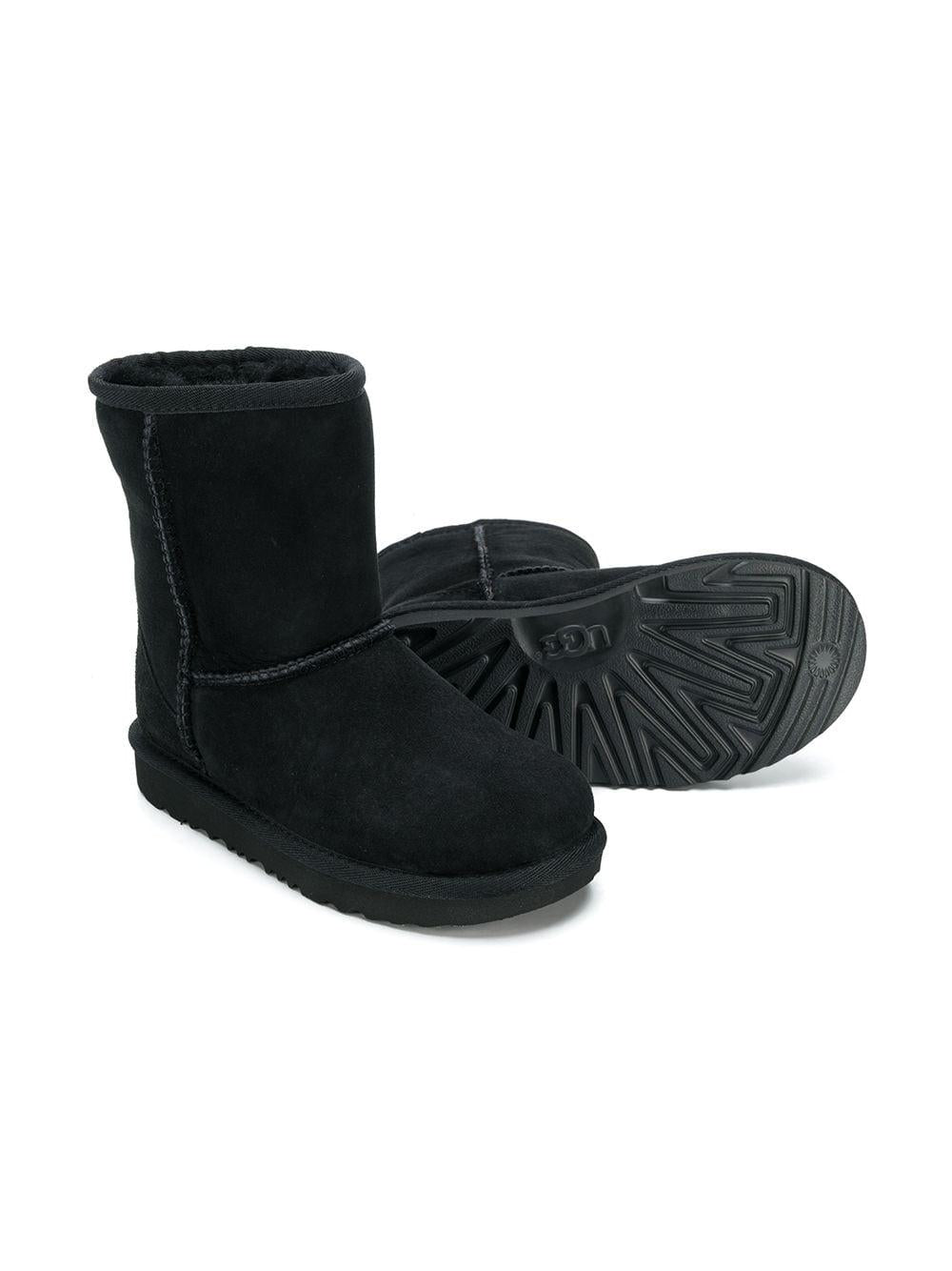 Stivaletti con fodera in pelliccia per bambina UGG Kids neri con punta tonda 1017703K BLK UGG 