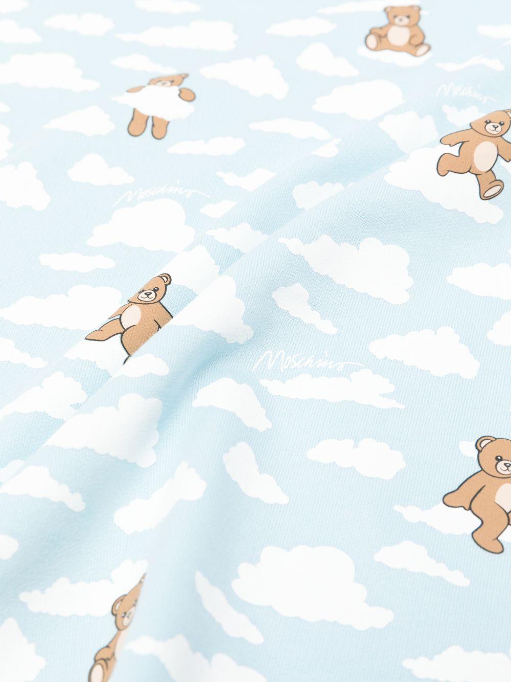 Coperta per neonato Moschino Kids azzurro con nuvole di peluche all-over MRB00FLCA19 83679 MOSCHINO KIDS 