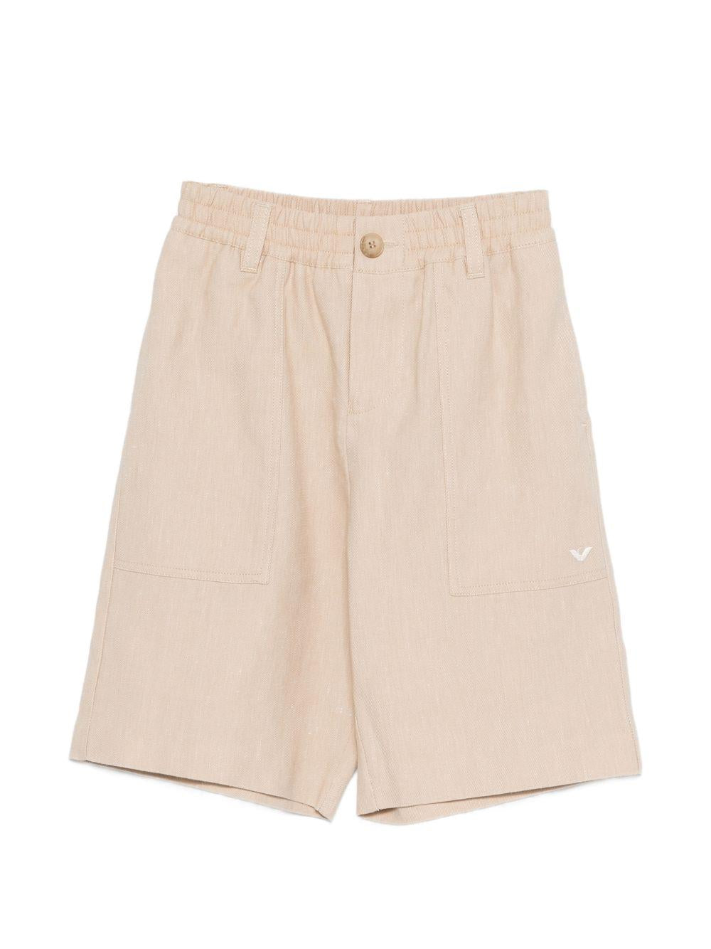 Shorts per bambino Emporio Armani Kids beige con logo aquila sul davanti EB001063 AF20957 U6151 EMPORIO ARMANI KIDS 