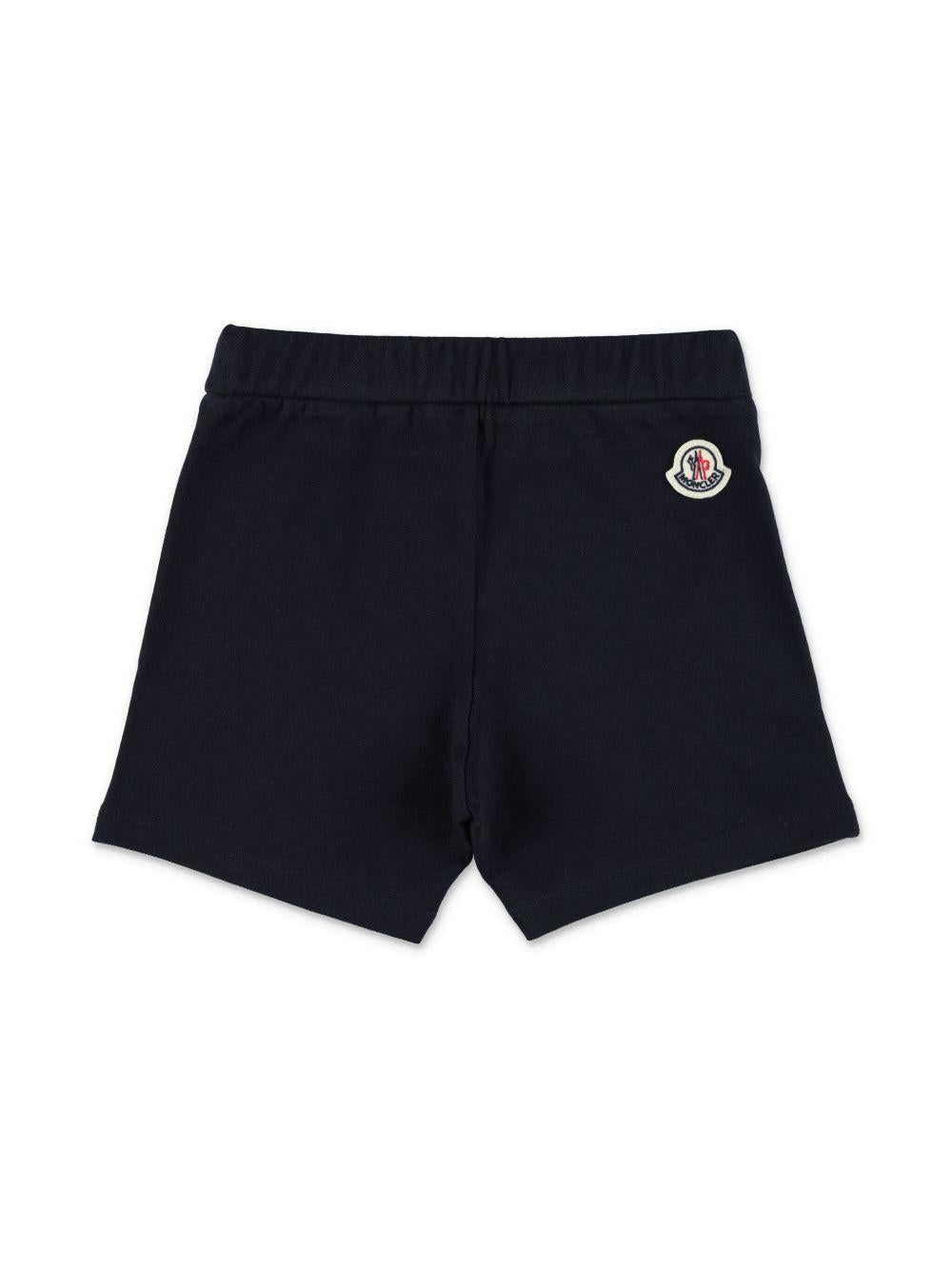 Set t-shirt e shorts per neonato Moncler Enfant multicolore con logo sul davanti L19518M000158496F F07 MONCLER KIDS 