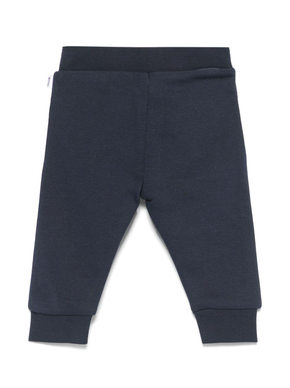 Pantaloni sportivi con stampa per neonato BOSS Kidswear blu con orli a coste J52072 849 BOSS KIDS 