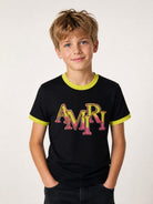 T-shirt per bambino Amiri Kids nera con logo sul davanti ACTOJR1029 001 AMIRI KIDS 