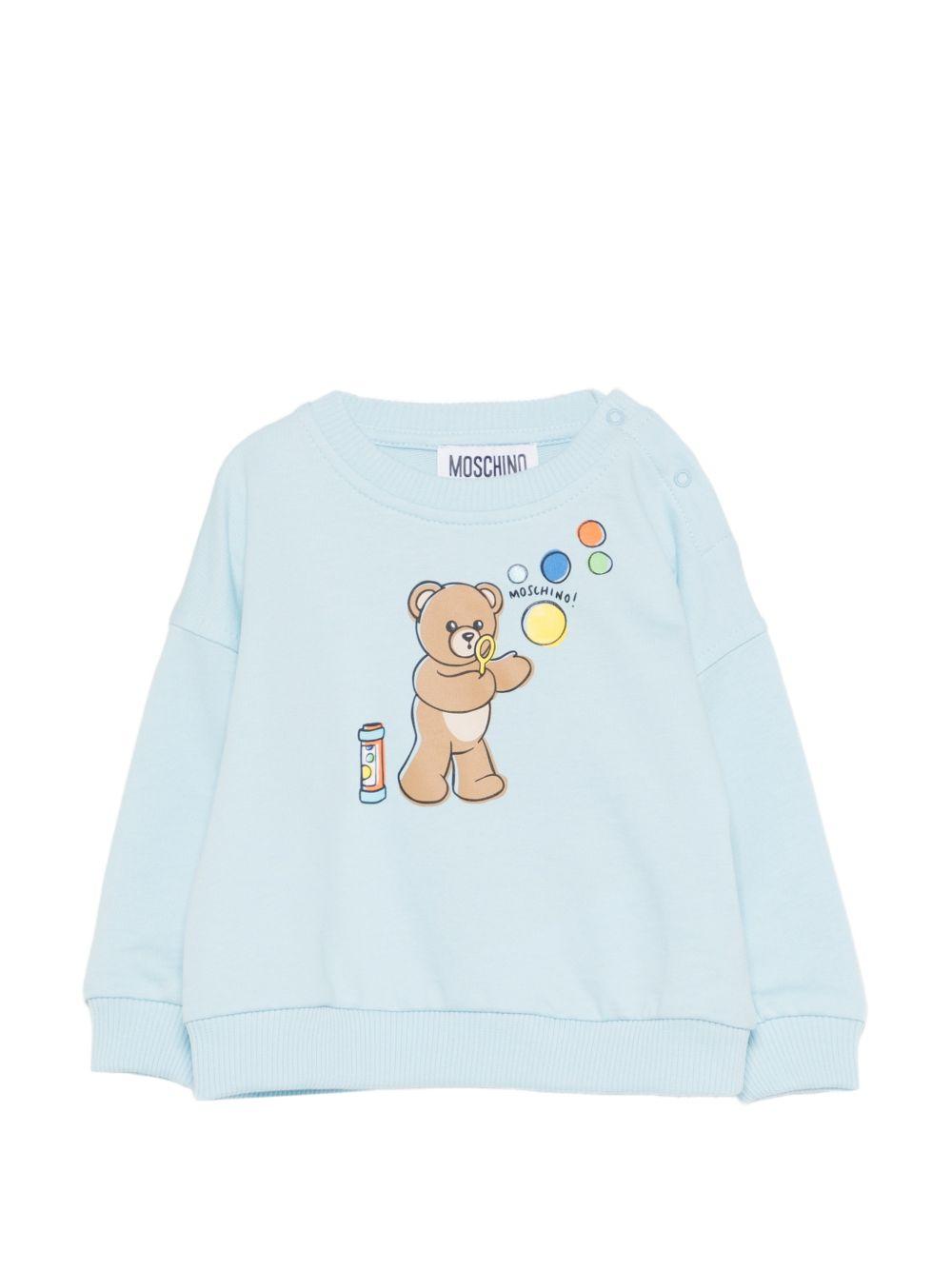 Felpa per neonati Moschino Kids azzurra con stampa grafica Teddy Bear MUF069LCA19 40304 MOSCHINO KIDS 