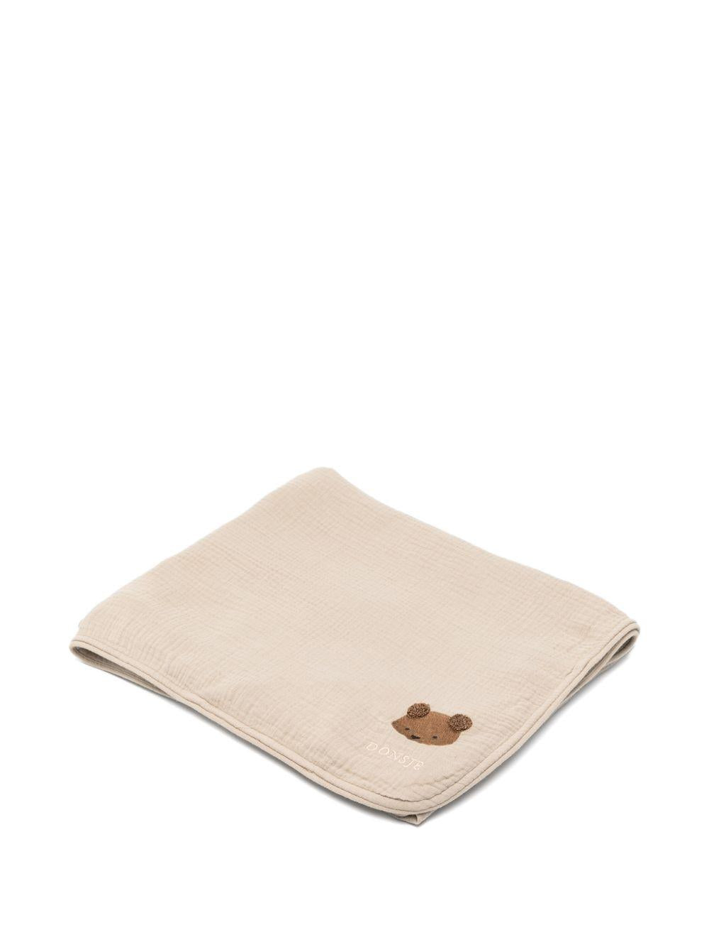 Coperta Plokie per neonati Donsje beige con ricamo orsetto 7100101 00017 DONSJE 