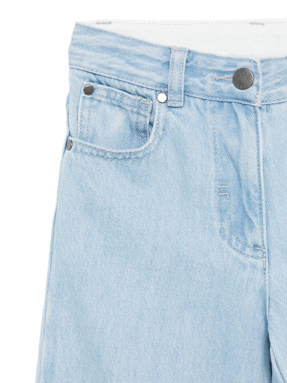 Jeans per bambina Stella McCartney Kids in denim con stampa floreale TX6A00 Z0746 606 STELLA McCARTNEY KIDS 
