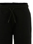 Pantaloni sportivi per bambino MSGM Kids nero con polsini elasticizzati F5MSJUFP024 110 MSGM KIDS 