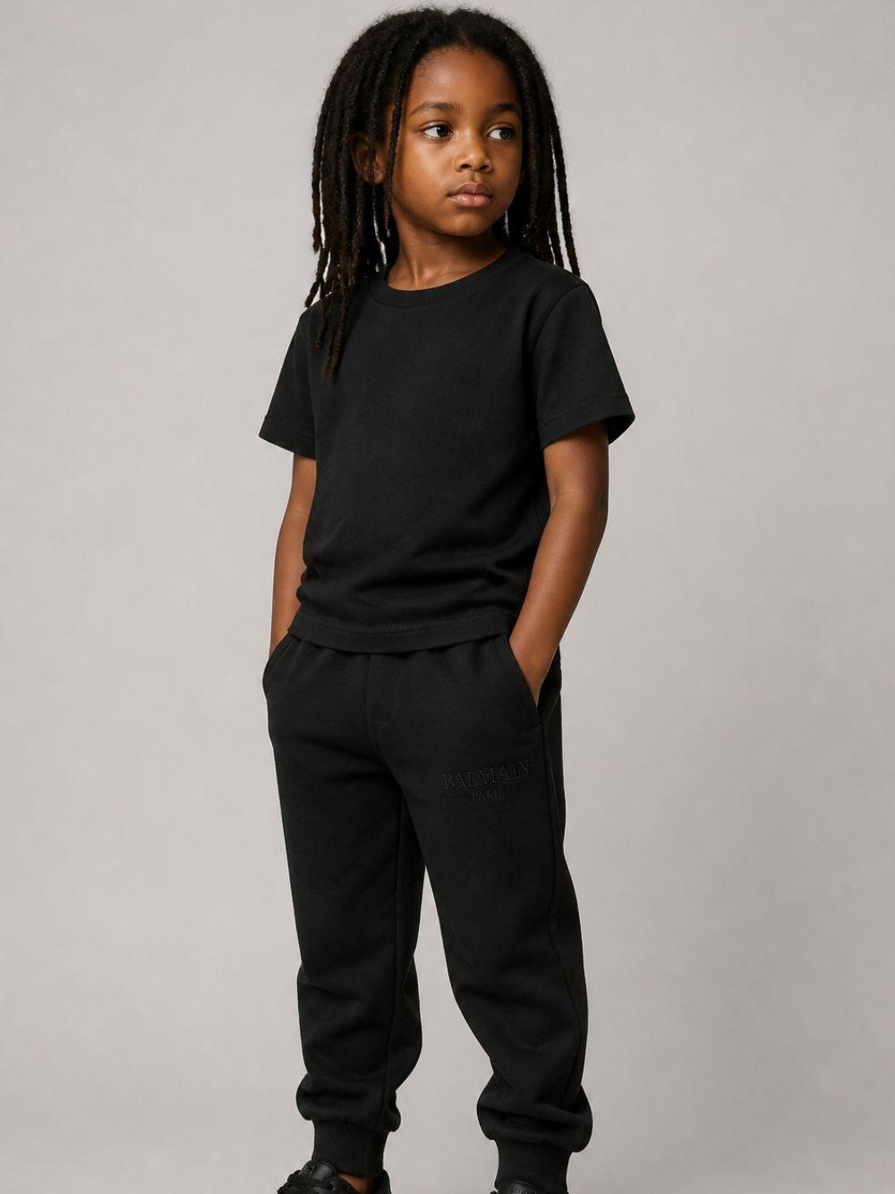 Pantaloni per bambino Balmain Kids neri con logo ricamato sul davanti BZ6I00 Z3183 930 BALMAIN KIDS 