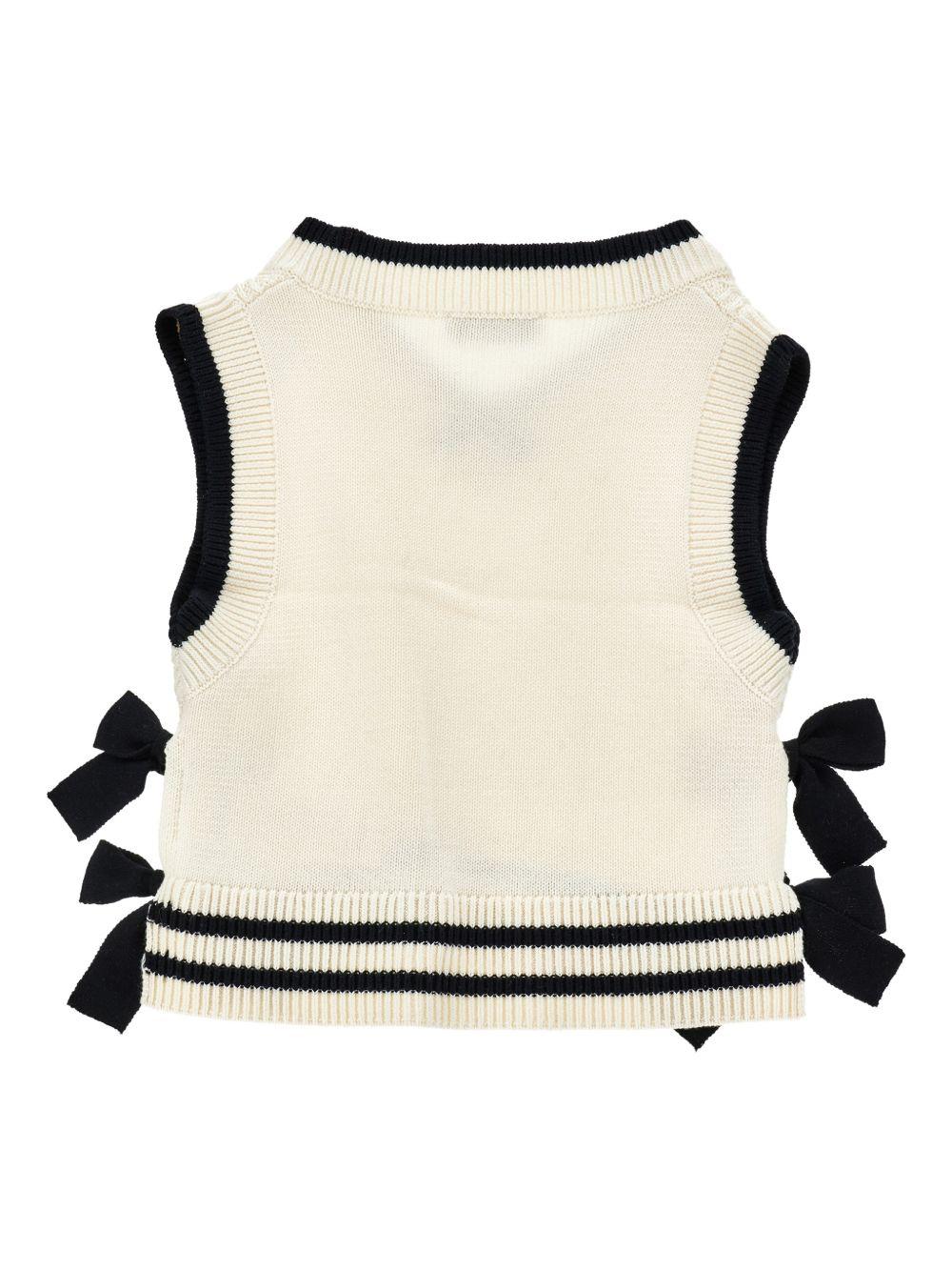 Gilet per bambina Philosophy di Lorenzo Serafini Kids bianco con dettagli fiocchi a contrasto I9G306 7034 0150 PHILOSOPHY 