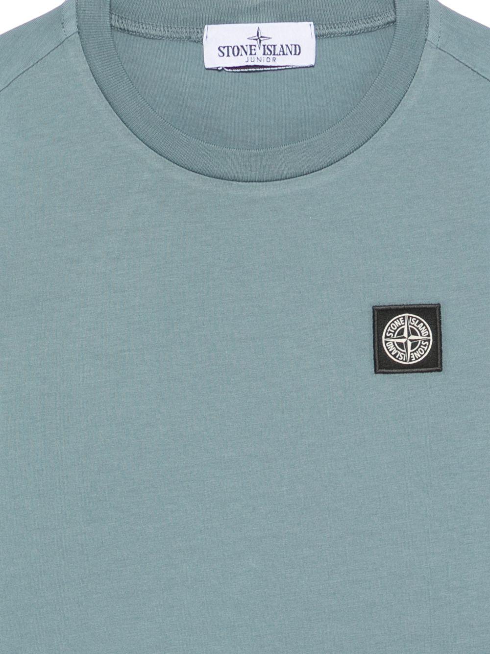 T-shirt per bambino Stone Island Kids azzurro con logo sul davanti L2S162100003S0047 V004B STONE ISLAND KIDS 