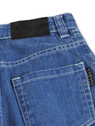 Shorts Arts per bambino Molo denim con design a cinque tasche 6S26H105 5653 MOLO KIDS 