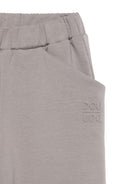 Pantaloni per bambina Douuod Kids grigi con logo goffrato DX6Q30 Z2858 907 DOUUOD 