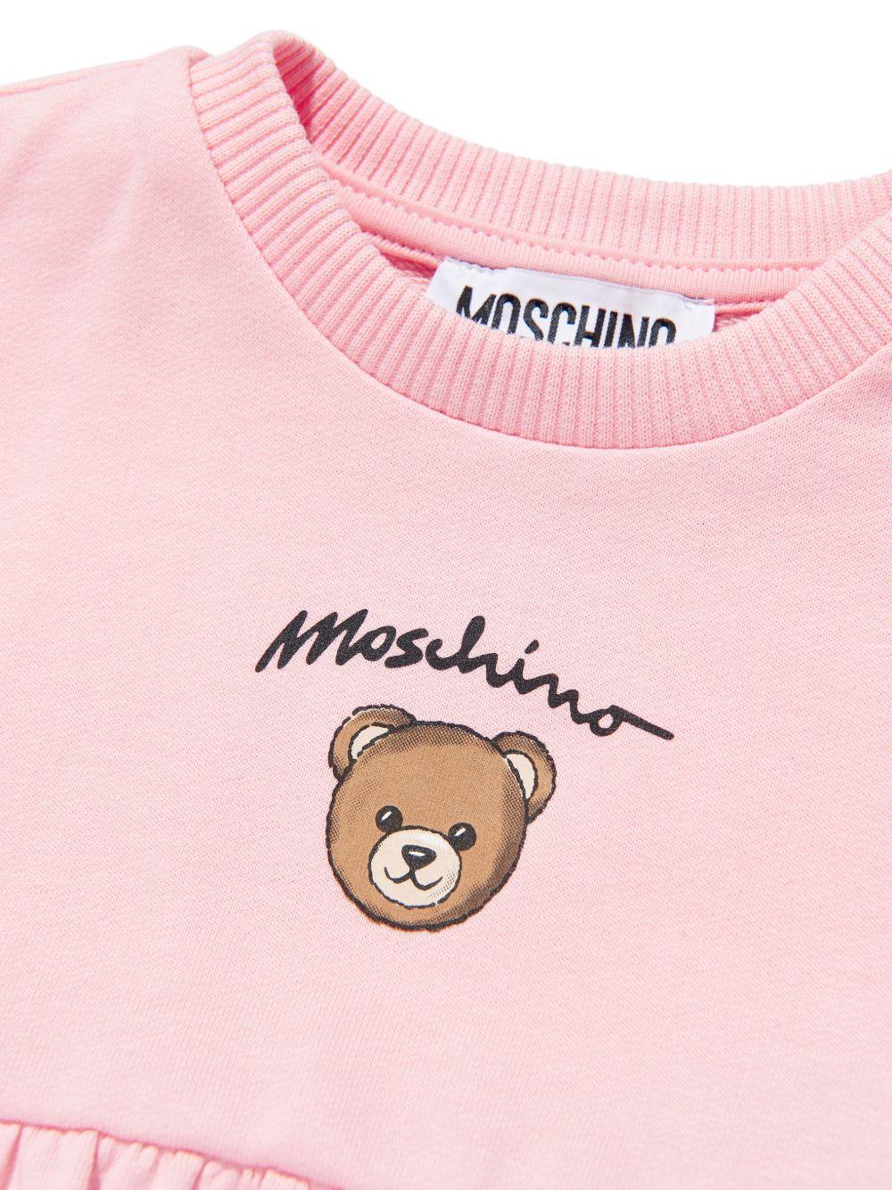 Abito per neonata Moschino Kids rosa con stampa Teddy Bear sul davanti MDV0DGLCA19 50209 MOSCHINO KIDS 