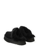Slippers per bambina UGG Kids Disquette nero con finitura in pelliccia sintetica 1122550 BLK UGG 