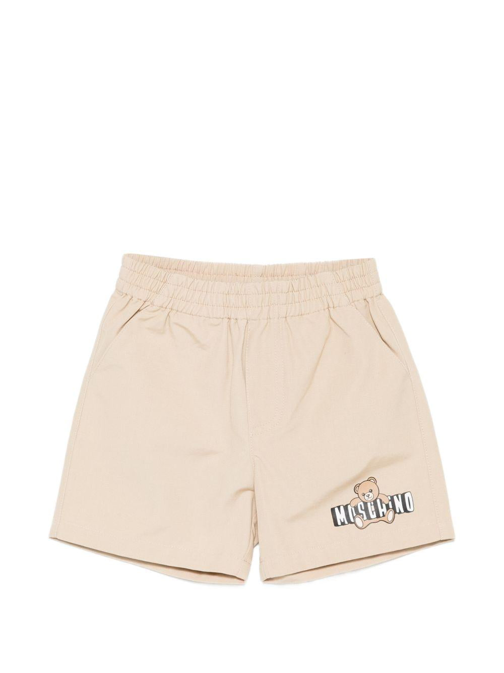 Shorts per neonati Moschino Kids beige con logo sul davanti MUQ01NLLA14 20829 MOSCHINO KIDS 