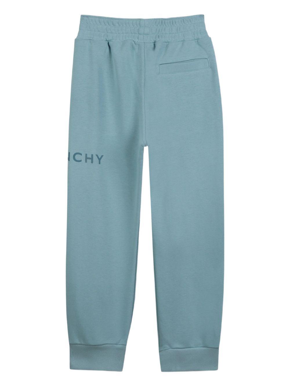 Joggers per bambino Givenchy Kids azzurro con logo sulla gamba H30922 040 GIVENCHY KIDS 