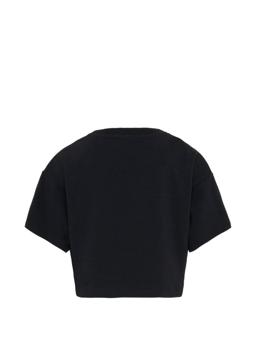 T-shirt per bambina Moschino Kids nera con stampa Teddy Bear HDM072LBA00 60100 MOSCHINO KIDS 